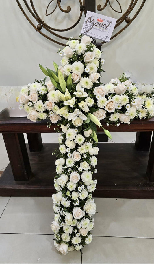 Cruz con flores