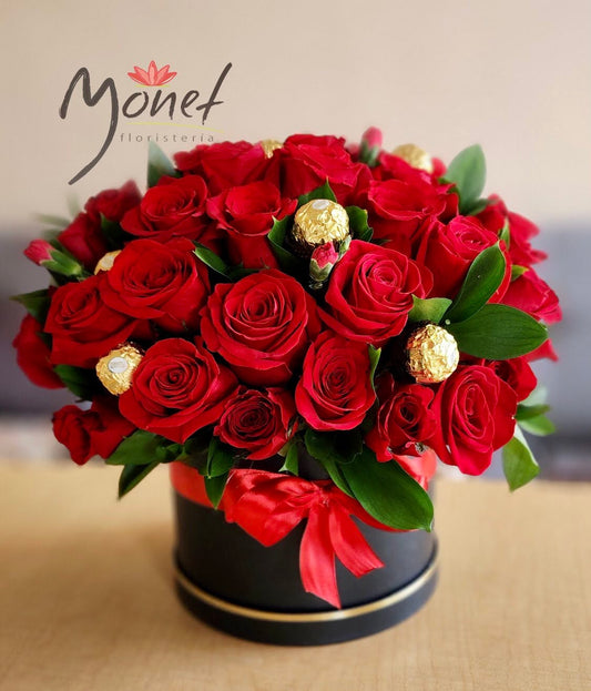 Cubeta con rosas rojas y Ferreros