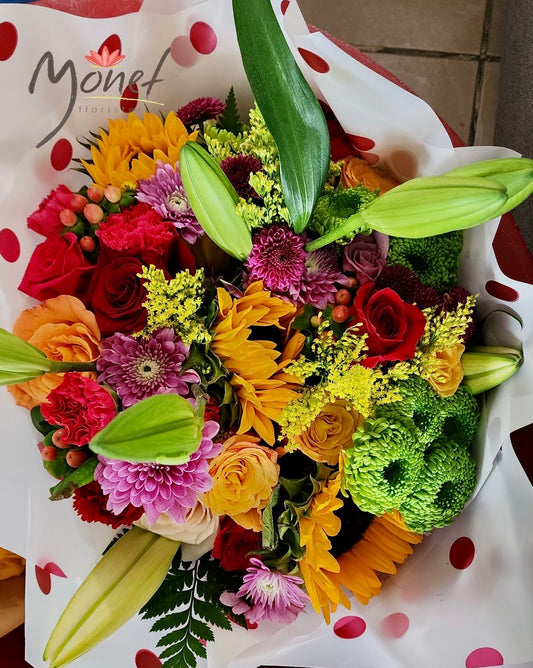 Ramillete con girasoles y flores varias