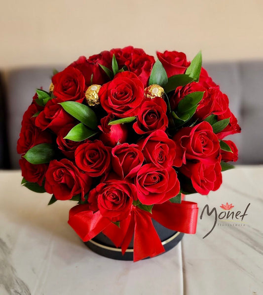 Cubeta con rosas rojas y chocolate