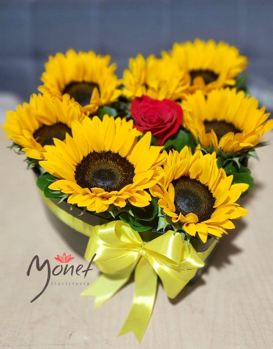 Girasoles con rosa
